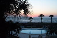 sunset from a balcony at the Lido Condominiums